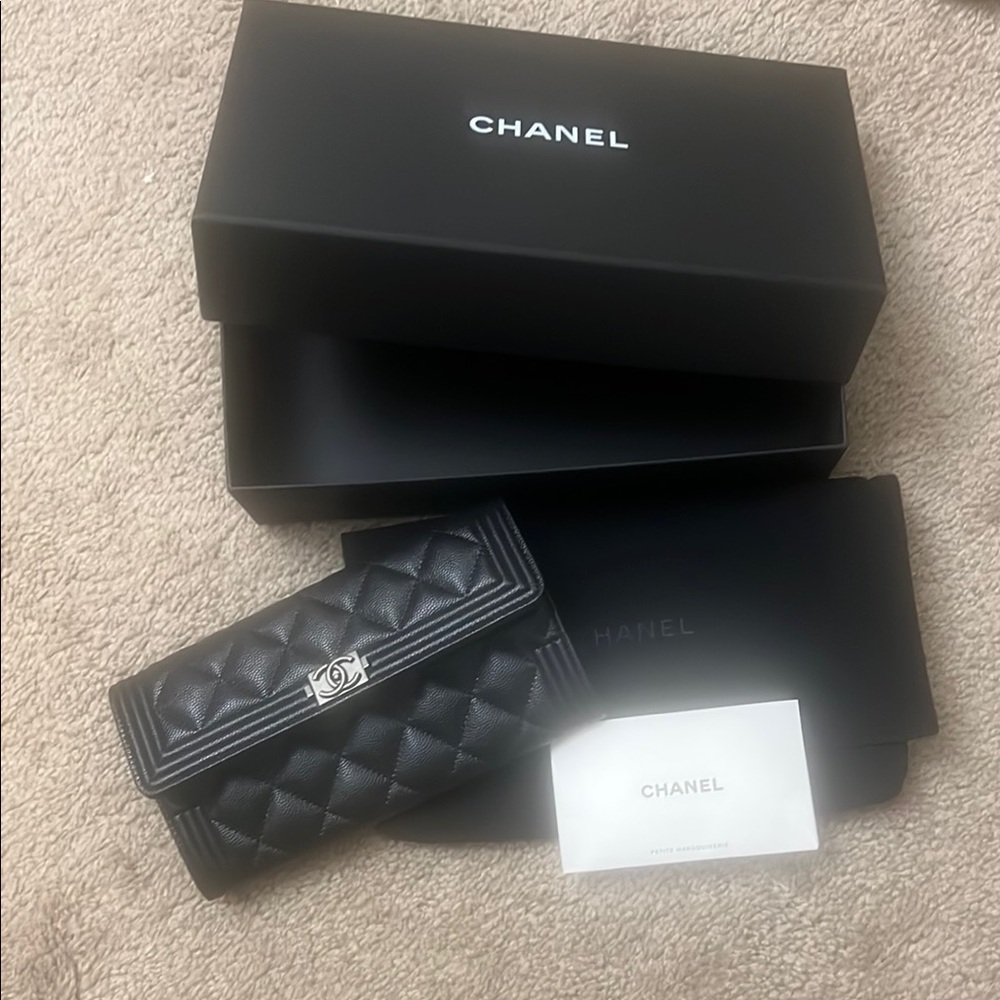 CHANEL Black Quilted Clutch with Silver Logo